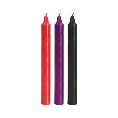 Velas colores de goteo japonés para juegos de placer y dolor.