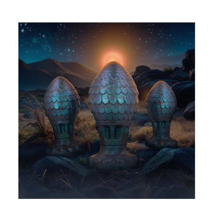 Imagen con paisaje cósmico imaginario con los plug de los 3 tamaños de Huevo Dragón de Epic Cybersilicock